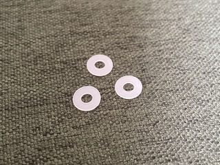 Plastic washers for the PCB mounting screws