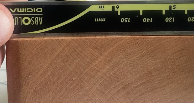 Base block gauged against a scale
